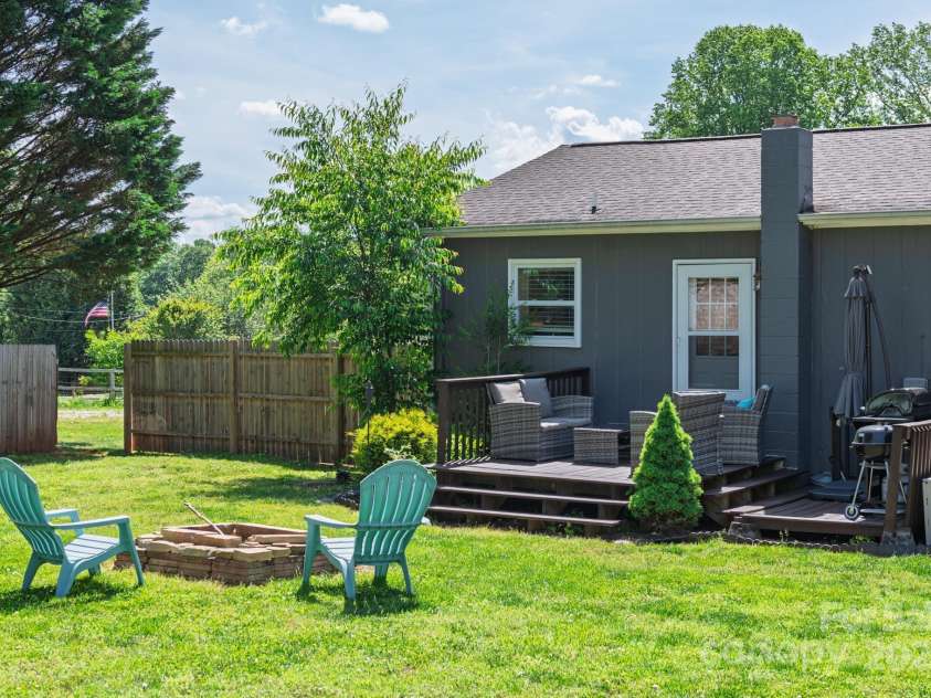 386 Greenlea Circle, Taylorsville, NC 28681.  MLS# CAR4257685, YatesRealty ID 13724. Back yard.