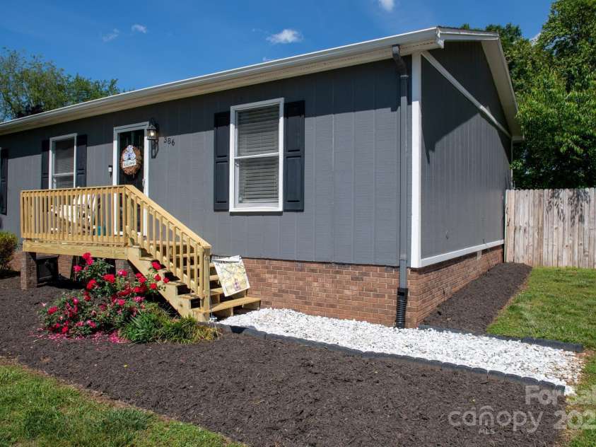 386 Greenlea Circle, Taylorsville, NC 28681.  MLS# CAR4257685, YatesRealty ID 13724. New front porch & landscaping.