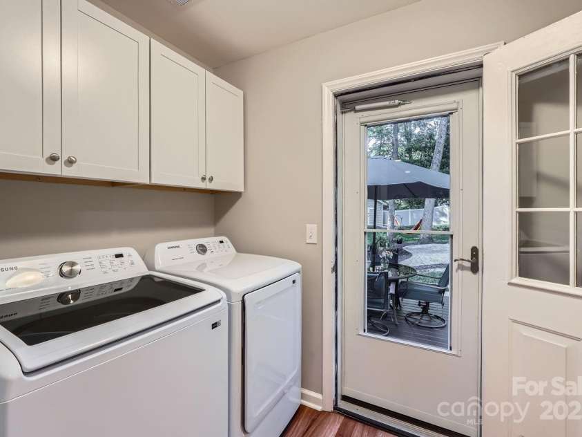 4145 Wall Street, Charlotte, NC 28209.  MLS# CAR4215362, YatesRealty ID 13725. Laundry room with cabinet storage.