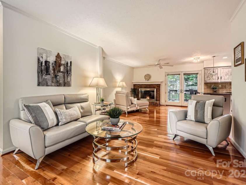 4145 Wall Street, Charlotte, NC 28209.  MLS# CAR4215362, YatesRealty ID 13725. Secondary view of living room which displays the open floor plan.