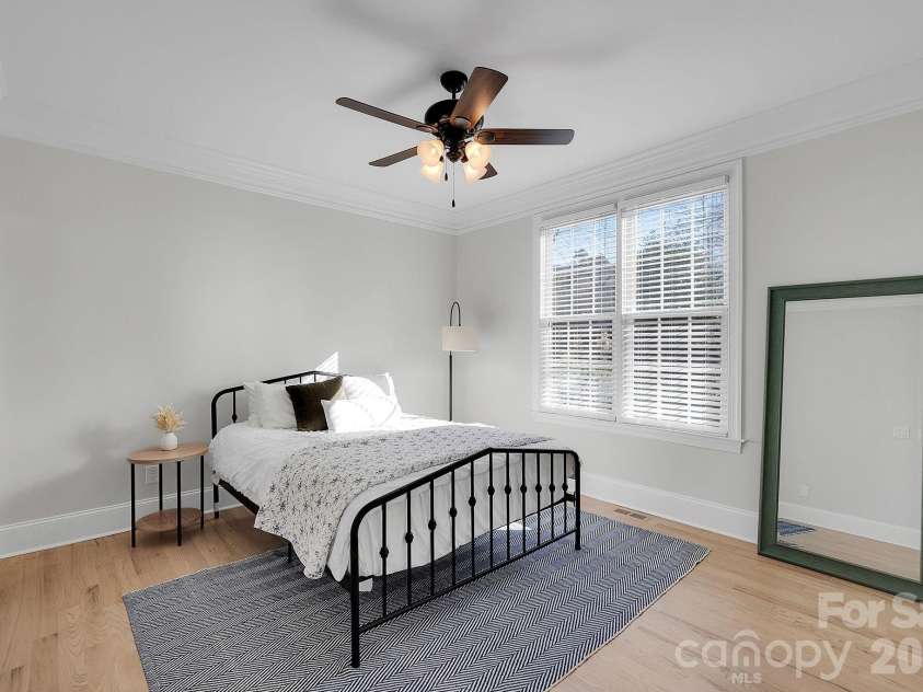7778 Burning Ridge Drive, Stanley, NC 28164.  MLS# CAR4336313, YatesRealty ID 13726. Well-sized secondary bedroom featuring neutral finishes, ceiling fan, and natural light. Flexible space suitable for a variety of uses