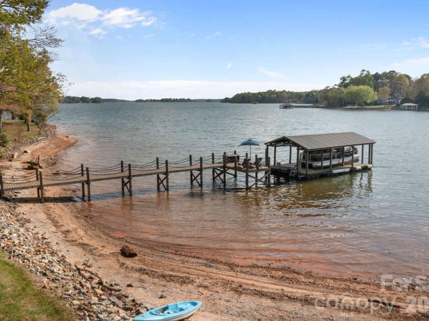 8927 Holdsclaw Road, Terrell, NC 28682.  MLS# CAR4364723, YatesRealty ID 13727. Permanent Dock w/ Covered Lift