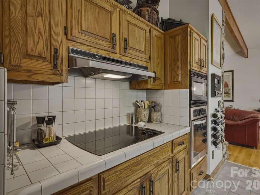 122 Lake Club Drive, Nebo, NC 28761.  MLS# CAR4369546, YatesRealty ID 13729. Kitchen Upper Level