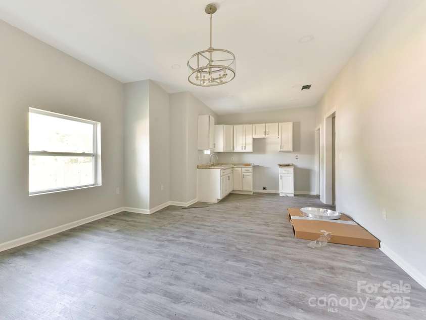 108 Graham Street, Chester, SC 29706.  MLS# CAR4240188, YatesRealty ID 13730. Dining area into kitchen