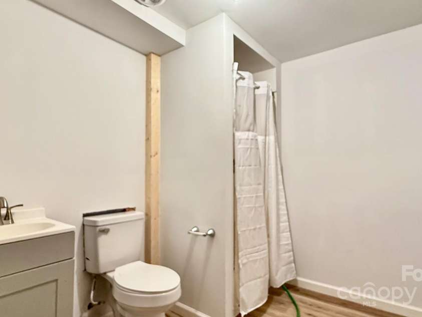 147 Forest Hill Drive, West Jefferson, NC 28694.  MLS# CAR4259437, YatesRealty ID 13735. Basement bathroom