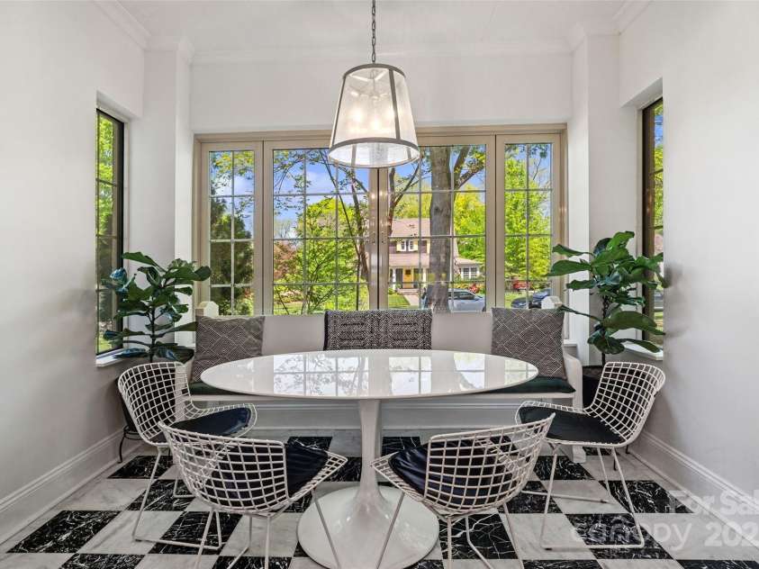 1025 Ardsley Road, Charlotte, NC 28207.  MLS# CAR4250466, YatesRealty ID 13738. Sunroom and Dining area