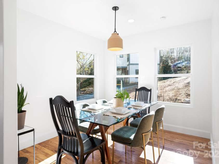 107 Beautyberry Drive, Asheville, NC 28801.  MLS# CAR4204938, YatesRealty ID 1374. Dining Area is Full of Light