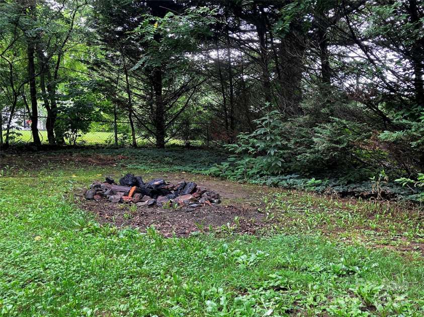 120 Harrison Street, Swannanoa, NC 28778.  MLS# CAR4292286, YatesRealty ID 13741. Firepit