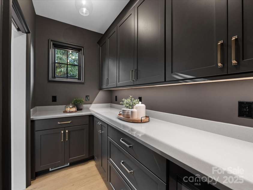 2608 Croydon Road, Charlotte, NC 28209.  MLS# CAR4255600, YatesRealty ID 13742. Scullery with wine fridge