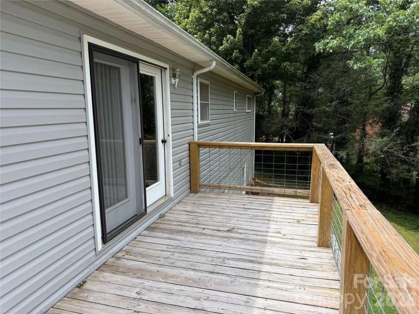 628 Hidden View Loop, Marion, NC 28752.  MLS# CAR4397253, YatesRealty ID 13743. Back porch