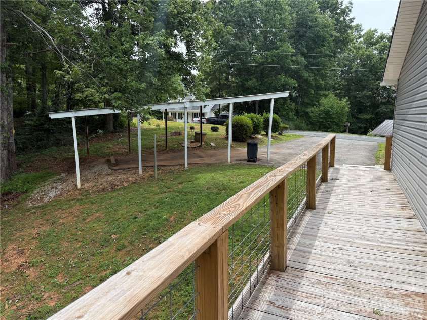 628 Hidden View Loop, Marion, NC 28752.  MLS# CAR4397253, YatesRealty ID 13743. Back porch