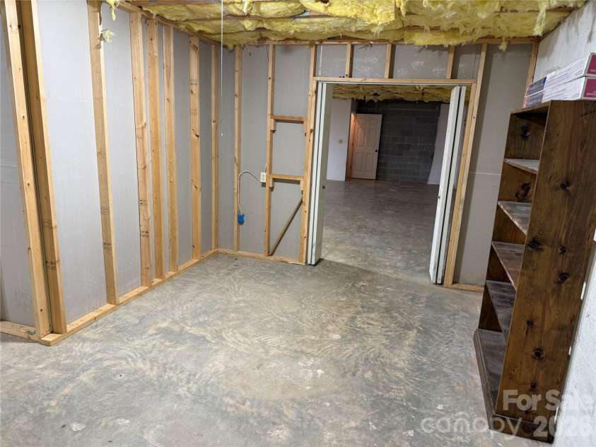 628 Hidden View Loop, Marion, NC 28752.  MLS# CAR4397253, YatesRealty ID 13743. Basement unfinished bedroom