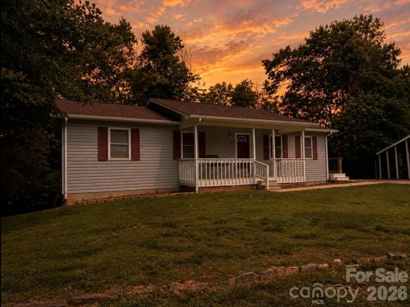 628 Hidden View Loop, Marion, NC 28752.  MLS# CAR4397253, YatesRealty ID 13743. Sky has been enhanced with ai