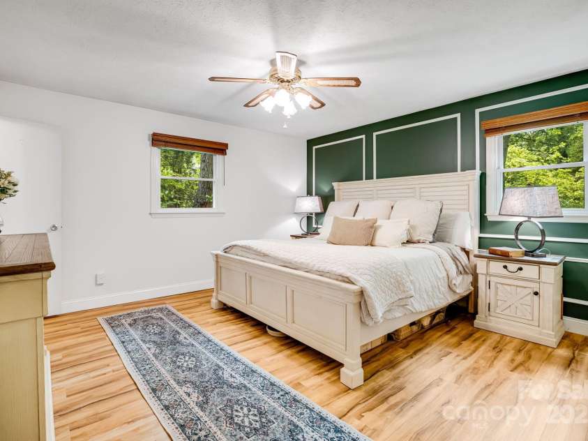 2044 Glenheath Drive, Hendersonville, NC 28791.  MLS# CAR4256090, YatesRealty ID 13744. Primary bedroom with accent wall