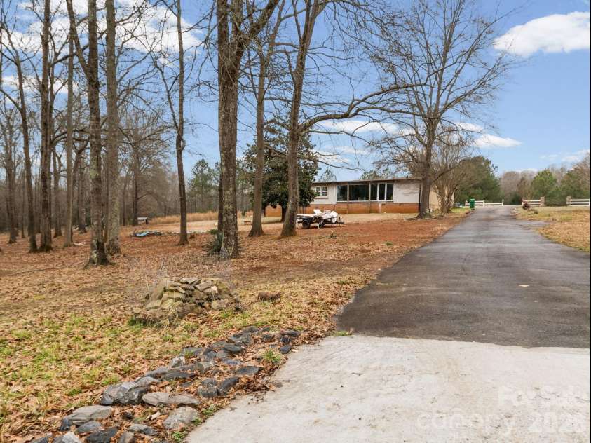 166 Fleece Lane, Mooresboro, NC 28114.  MLS# CAR4354679, YatesRealty ID 13748. 