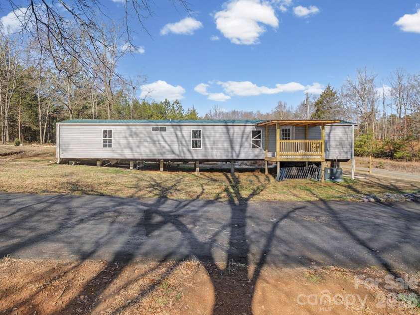 166 Fleece Lane, Mooresboro, NC 28114.  MLS# CAR4354679, YatesRealty ID 13748. 