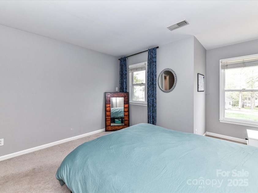 4743 Morning Dew Court, Charlotte, NC 28269.  MLS# CAR4244275, YatesRealty ID 13756. 2nd Bedroom with tons of natural light and attached private bathroom!