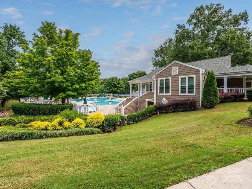 4743 Morning Dew Court, Charlotte, NC 28269.  MLS# CAR4244275, YatesRealty ID 13756. Community Club House and pool