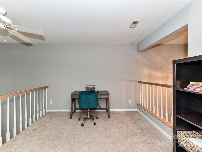 4743 Morning Dew Court, Charlotte, NC 28269.  MLS# CAR4244275, YatesRealty ID 13756. Loft area overlooking the great room and foyer