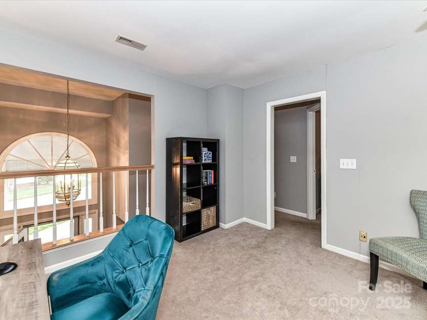 4743 Morning Dew Court, Charlotte, NC 28269.  MLS# CAR4244275, YatesRealty ID 13756. Loft area overlooking the great room and foyer