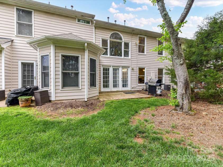 4743 Morning Dew Court, Charlotte, NC 28269.  MLS# CAR4244275, YatesRealty ID 13756. Private Patio and access to townhouse yard!