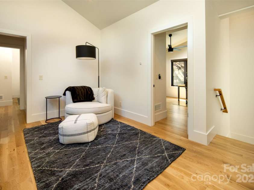 42 Spring Cove Road, Asheville, NC 28804.  MLS# CAR4246585, YatesRealty ID 13759. All three bedrooms access common area for ideal privacy and flow.