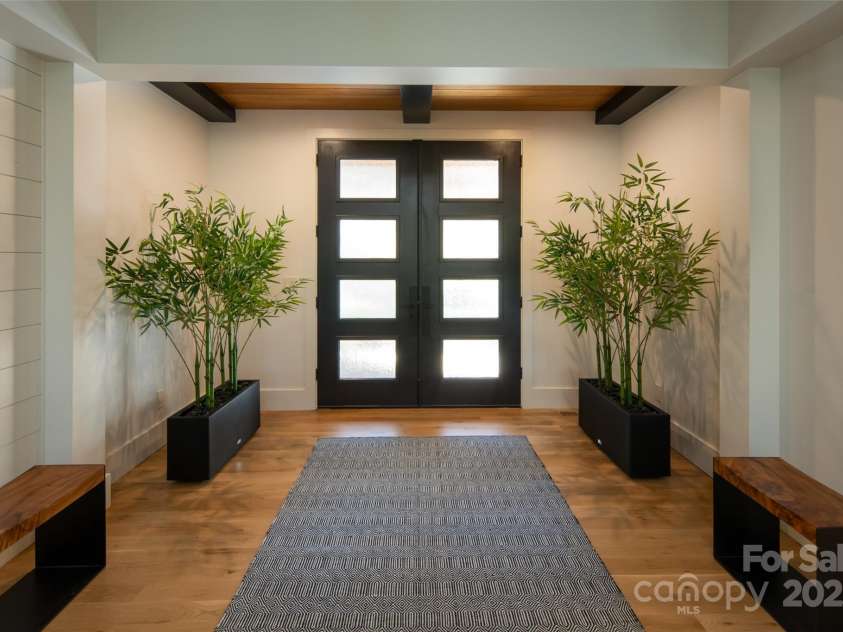 42 Spring Cove Road, Asheville, NC 28804.  MLS# CAR4246585, YatesRealty ID 13759. Interior entryway with coffered/beam ceiling and custom nickel gap walls.