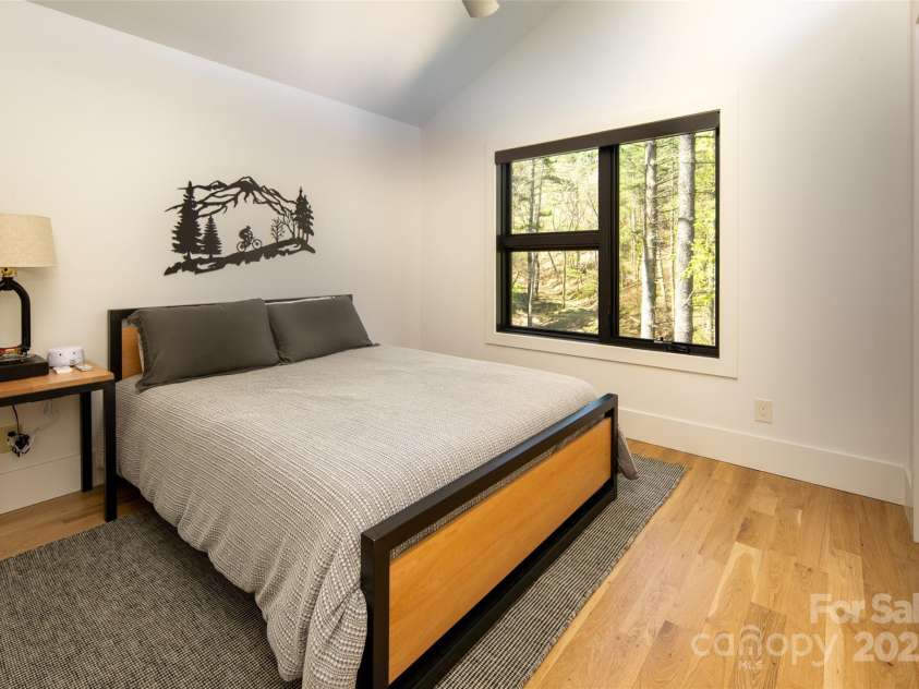 42 Spring Cove Road, Asheville, NC 28804.  MLS# CAR4246585, YatesRealty ID 13759. Second of three bedrooms on second floor features vaulted ceiling and incredible views.