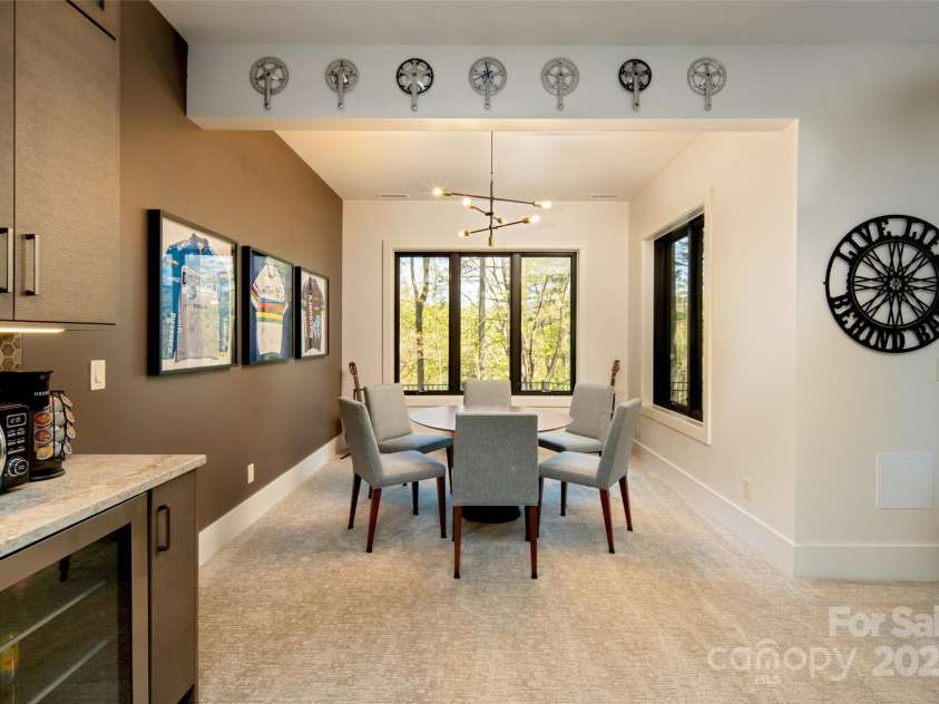 42 Spring Cove Road, Asheville, NC 28804.  MLS# CAR4246585, YatesRealty ID 13759. Yet another seating area can be used for additional dining, game night, crafting or even an artist studio area (tons of great light!). 