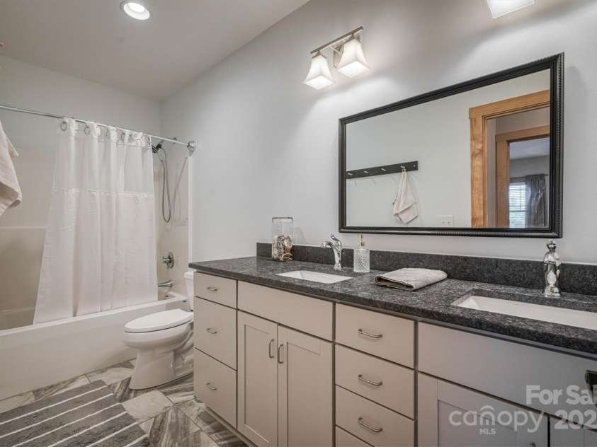 381 Scenic Overlook Drive, Nebo, NC 28761.  MLS# CAR4294911, YatesRealty ID 1376. Guest Bathroom