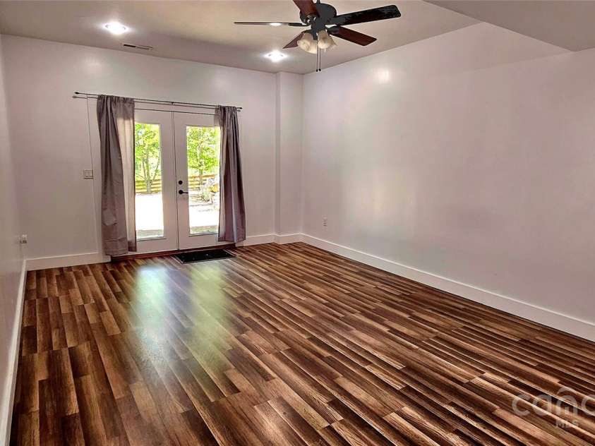 5 Valley Drive, Weaverville, NC 28787.  MLS# CAR4227304, YatesRealty ID 1376. Downstairs Bedroom