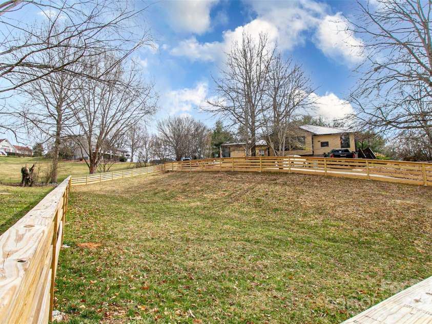 5 Valley Drive, Weaverville, NC 28787.  MLS# CAR4227304, YatesRealty ID 1376. Fenced Back yard