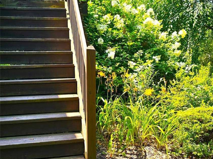 5 Valley Drive, Weaverville, NC 28787.  MLS# CAR4227304, YatesRealty ID 1376. Front Steps Flowers