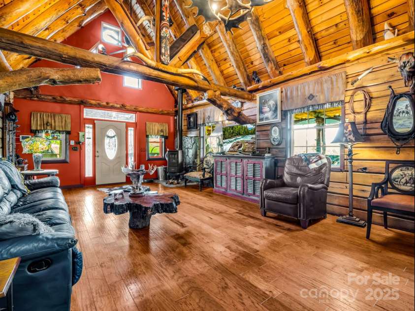 1002 CC Road, Rutherfordton, NC 28139.  MLS# CAR4249234, YatesRealty ID 13761. Great room with beautiful woodwork, posts and beams.