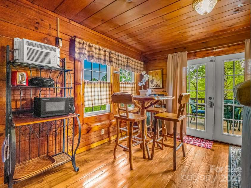 1002 CC Road, Rutherfordton, NC 28139.  MLS# CAR4249234, YatesRealty ID 13761. Guest cabin dining area on the first floor.