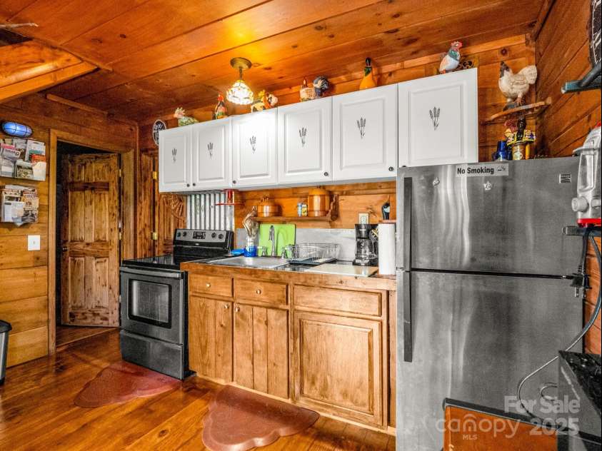 1002 CC Road, Rutherfordton, NC 28139.  MLS# CAR4249234, YatesRealty ID 13761. Guest cabin kitchen.
