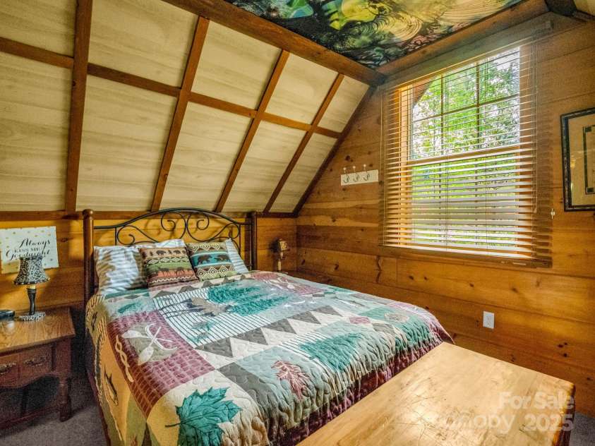 1002 CC Road, Rutherfordton, NC 28139.  MLS# CAR4249234, YatesRealty ID 13761. Upstairs guest room in the guest cabin.