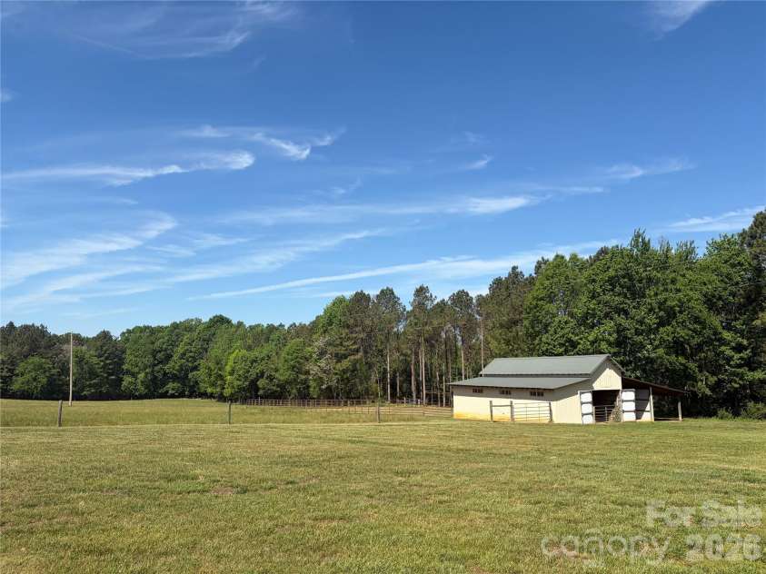 7812 Hwy 742 Highway, Marshville, NC 28103.  MLS# CAR4383299, YatesRealty ID 13761. 3 stall barn with hay loft and direct access to fenced pasture