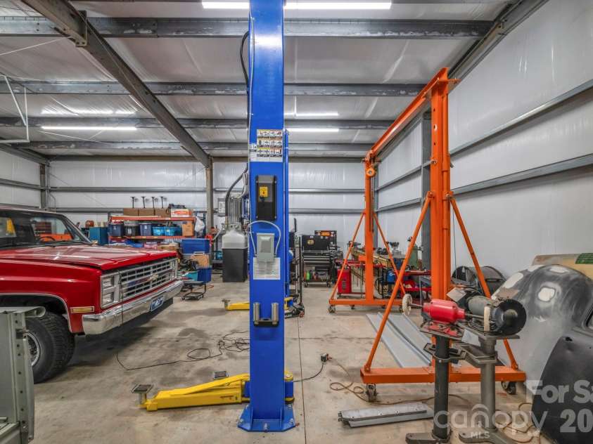 7812 Hwy 742 Highway, Marshville, NC 28103.  MLS# CAR4383299, YatesRealty ID 13761. Car lift conveys with property