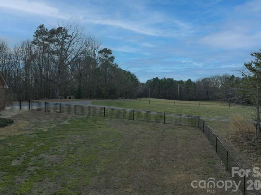 7812 Hwy 742 Highway, Marshville, NC 28103.  MLS# CAR4383299, YatesRealty ID 13761. Fenced back yard with direct access from the mud room
