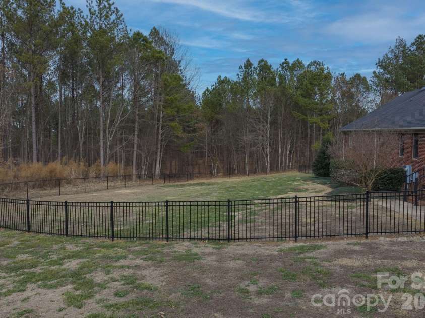 7812 Hwy 742 Highway, Marshville, NC 28103.  MLS# CAR4383299, YatesRealty ID 13761. Fenced backyard of the house for dogs and animals alike