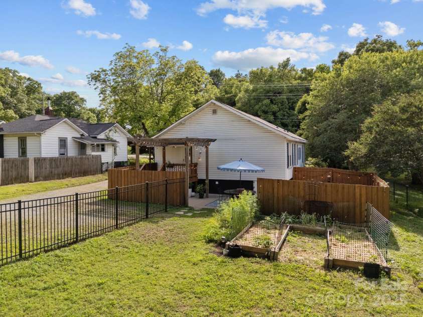 1001 Old Charlotte Road, Concord, NC 28027.  MLS# CAR4254324, YatesRealty ID 13764. Plenty of space for gardening