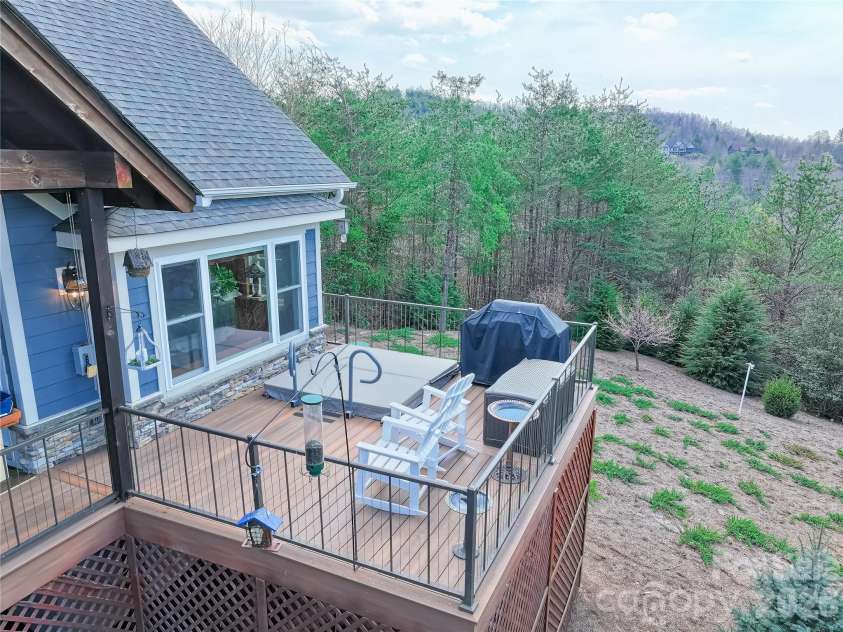 1103 River Ridge Way, Lenoir, NC 28645.  MLS# CAR4364618, YatesRealty ID 13770. Back deck with hot tub and views