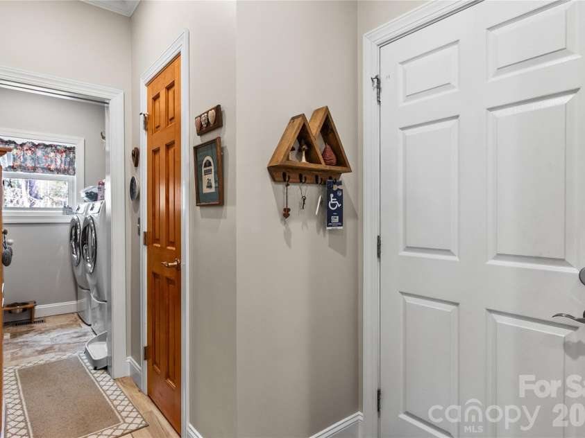 1103 River Ridge Way, Lenoir, NC 28645.  MLS# CAR4364618, YatesRealty ID 13770. Hall w/Garage & Laundry room access