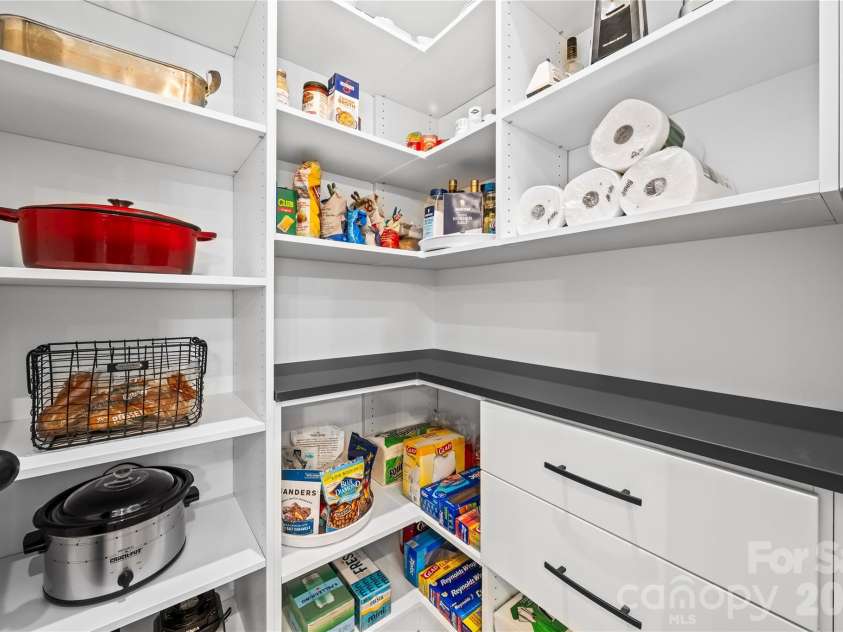 9838 Quercus Lane, Huntersville, NC 28078.  MLS# CAR4358813, YatesRealty ID 13787. Custom walk-in pantry by Impeccable Closets