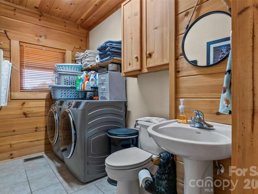 16 Saratoga Drive, Nebo, NC 28761.  MLS# CAR4338569, YatesRealty ID 13794. Guest Bath/Laundry Room
