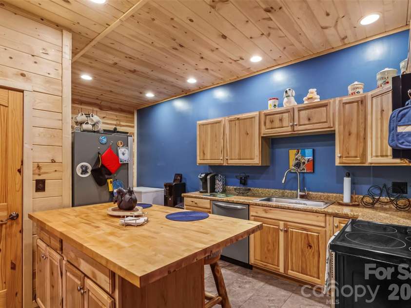 16 Saratoga Drive, Nebo, NC 28761.  MLS# CAR4338569, YatesRealty ID 13794. In-Law Suite Kitchen