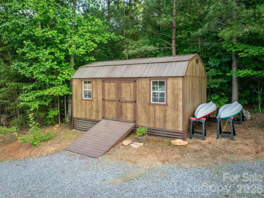 16 Saratoga Drive, Nebo, NC 28761.  MLS# CAR4338569, YatesRealty ID 13794. Storage Shed