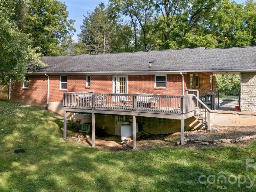 30 Valley Hill Drive, Canton, NC 28716.  MLS# CAR4364203, YatesRealty ID 13798. Back view of home