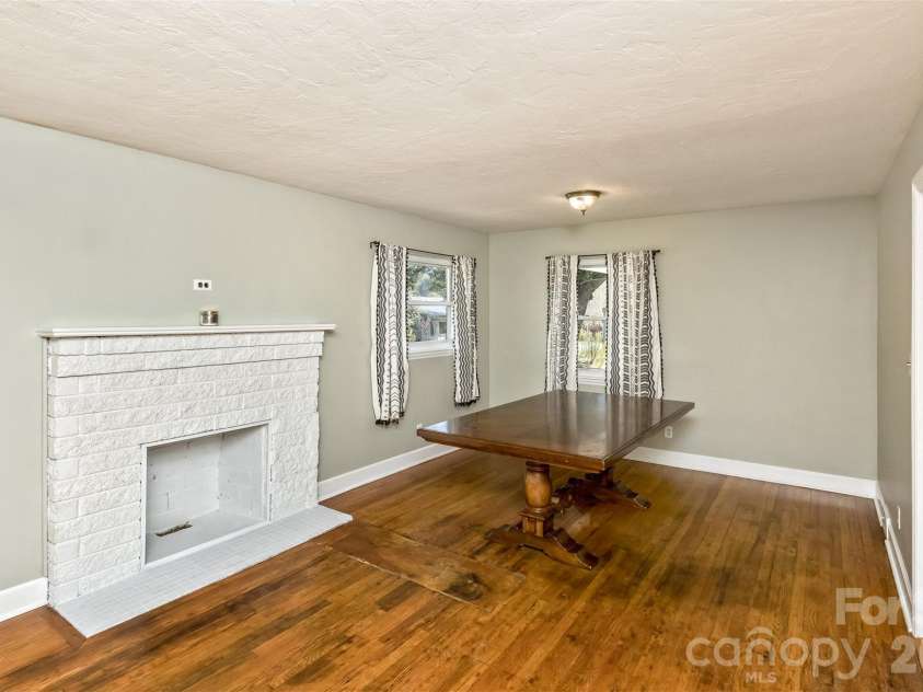 30 Valley Hill Drive, Canton, NC 28716.  MLS# CAR4364203, YatesRealty ID 13798. Fireplace and Dining Area
